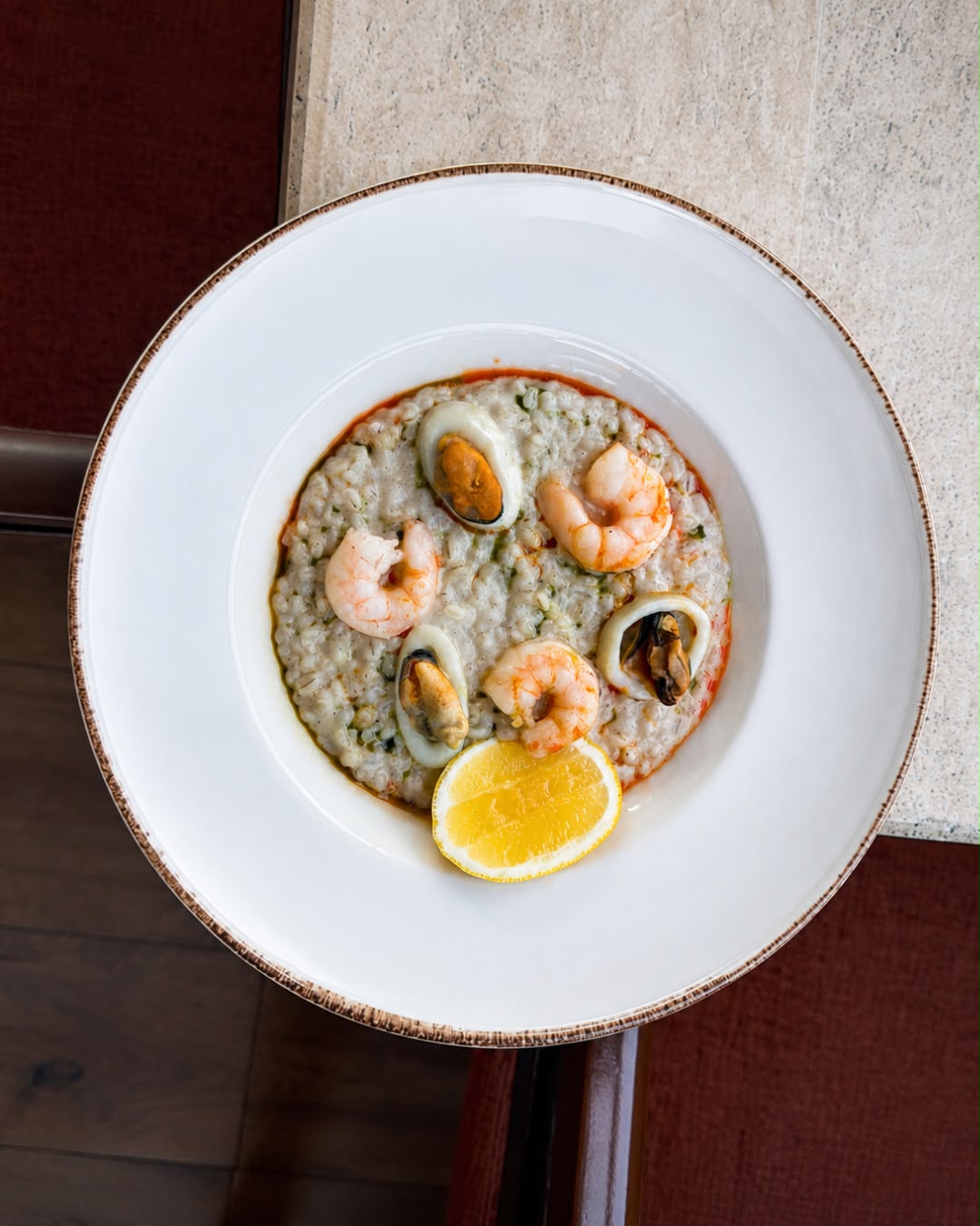Seafood barley risotto with shrimp, mussels and lemon at See360 Restaurant